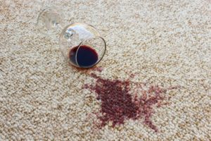 Red wine spilt on carpet